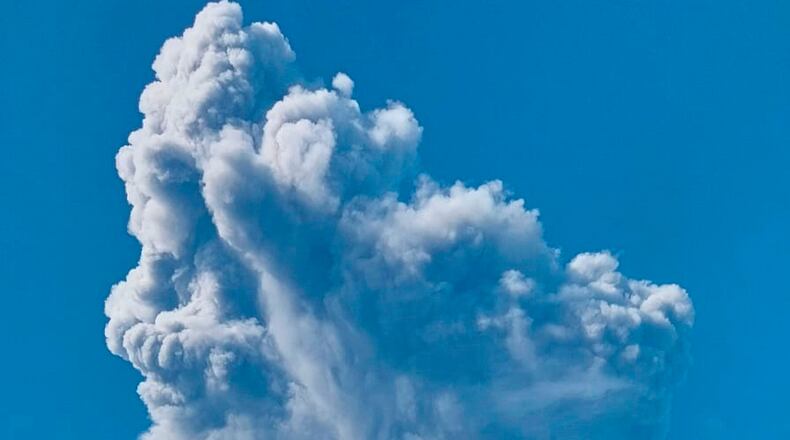 In this photo released by the Badan Geologi, the geological agency of Indonesia's Ministry of Energy and Mineral Resources, Mount Dukono releases volcanic materials during an eruption in North Halmahera, Indonesia, Friday, May 8, 2026. (Badan Geologi via AP)
