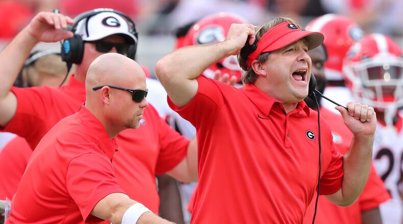 Georgia head coach Kirby Smart coaches his team up from the sidelines during the first half against Florida in a NCAA college football game on Saturday, October 28, 2017, in Jacksonville. Curtis Compton/ccompton@ajc.com