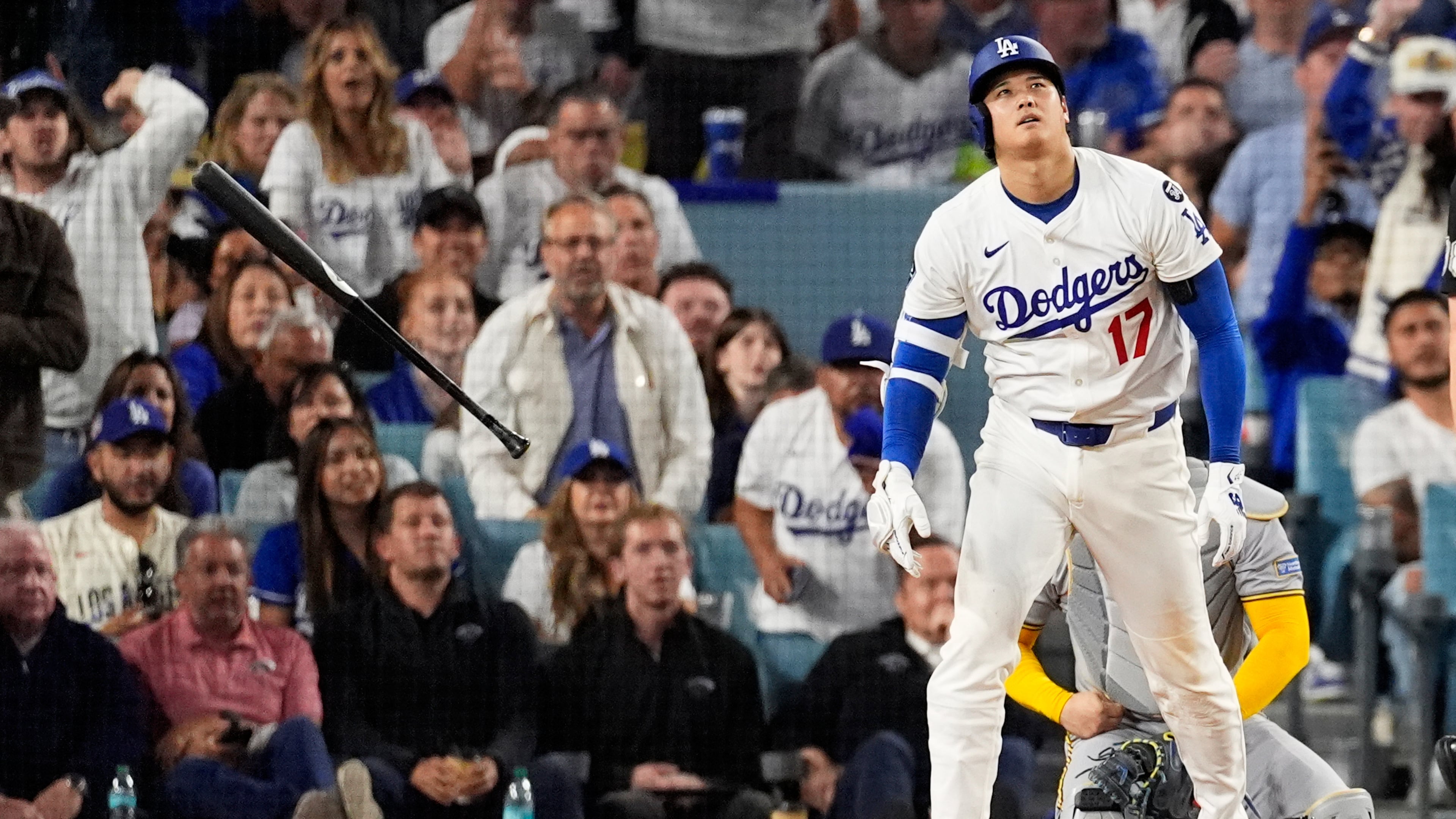 Los Angeles Dodgers' Shohei Ohtani watches his home run against the Milwaukee Brewers during the fourth inning in Game 4 of baseball's National League Championship Series, Friday, Oct. 17, 2025, in Los Angeles. (AP Photo/Mark J. Terrill)