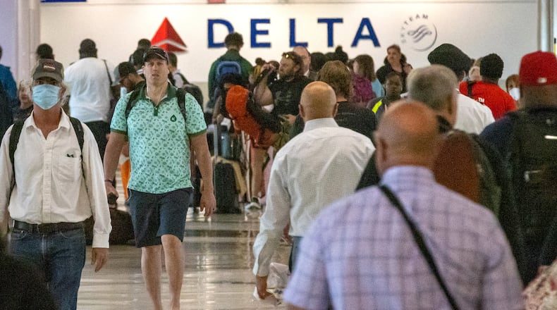 Passengers make their way through Concourse A at Hartsfield-Jackson Atlanta International Airport on Wednesday, June 22, 2022. Steve Schaefer / steve.schaefer@ajc.com)