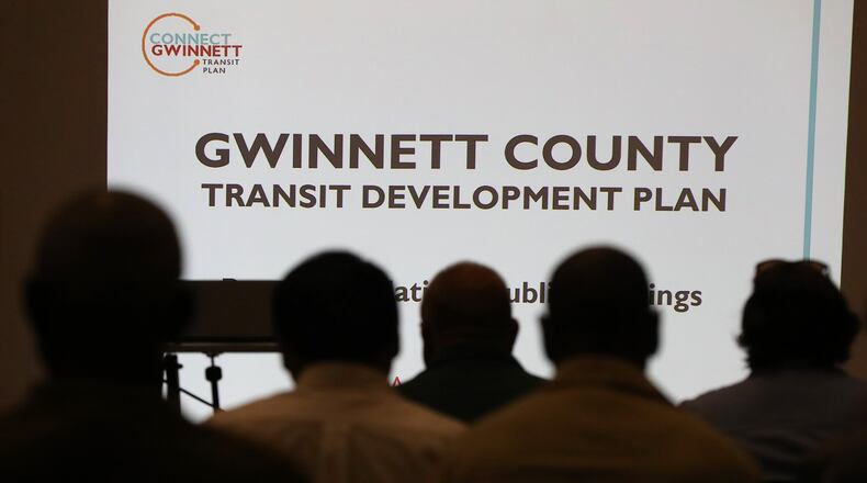 Local residents attend a Gwinnett County open house and information session on its proposed transit plan at the Gwinnett Justice and Administrative Center on April 25 in Lawrenceville. CURTIS COMPTON / CCOMPTON@AJC.COM