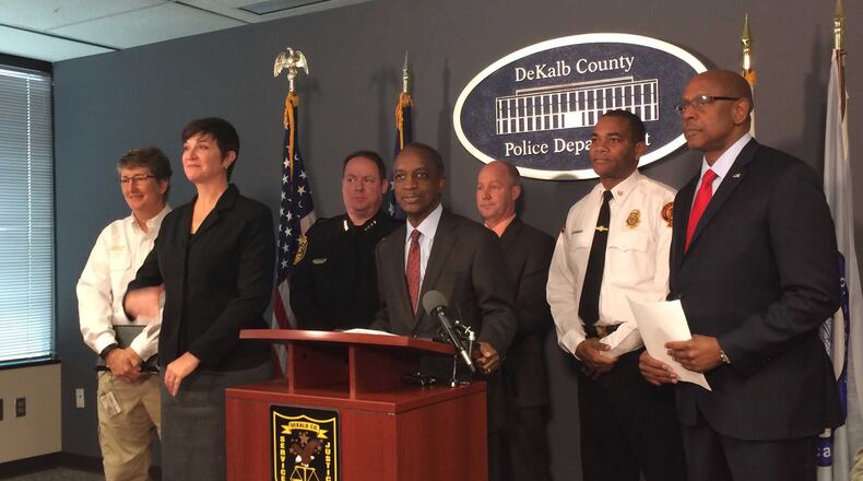 DeKalb County CEO Mike Thurmond, center, and emergency officials warn residents to prepare for a snow storm that could arrive Friday evening. The spoke at a press conference Thursday at DeKalb police headquarters. From left: Susan Loeffler, director for the DeKalb Emergency Management Agency; Donna Flanders, a nationally certified ASL interpreter; Police Chief James Conroy; Thurmond; 911 Director Marshall Mooneyham; Fire Chief Darnell Fullum; Public Safety Director Cedric Alexander. MARK NIESSE / MARK.NIESSE@AJC.COM