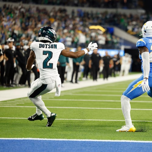 Los Angeles Chargers safety Tony Jefferson (23) intercepts a pass intended for Philadelphia Eagles wide receiver Jahan Dotson (2) during overtime of an NFL football game Monday, Dec. 8, 2025, in Inglewood, Calif. (AP Photo/Caroline Brehman)