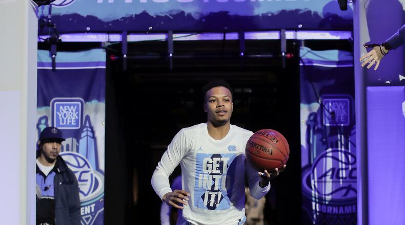 North Carolina guard Nate Britt runs onto the court before of an NCAA college basketball game against Duke during the semifinals of the Atlantic Coast Conference tournament, Friday, March 10, 2017, in New York. (AP Photo/Julie Jacobson)