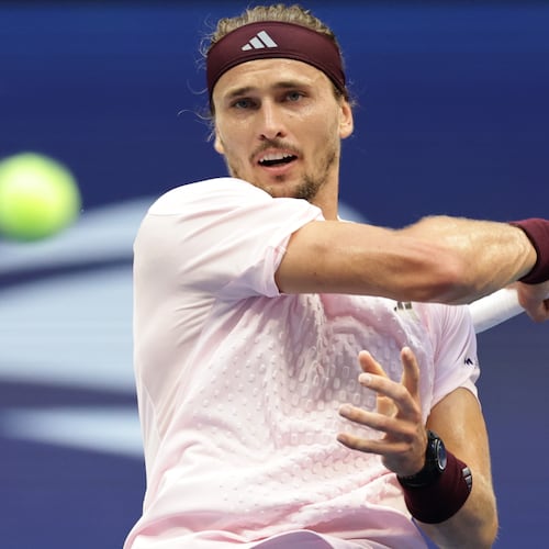 Alexander Zverev, of Germany, returns the ball to Ben Shelton, of the United States, during the men's singles final of the U.S. Open tennis championships Sunday, Sept. 13, 2026, in New York. (AP Photo/Adam Hunger)