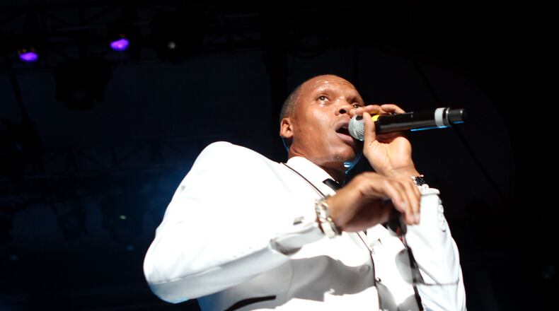 Ronnie DeVoe of the Eighties R&B boy band New Edition sings for their 30th anniversary reunion tour at Chastain Amphitheatre on Saturday, Sept. 2, 2012. Akili-Casundria Ramsess/Special to the AJC