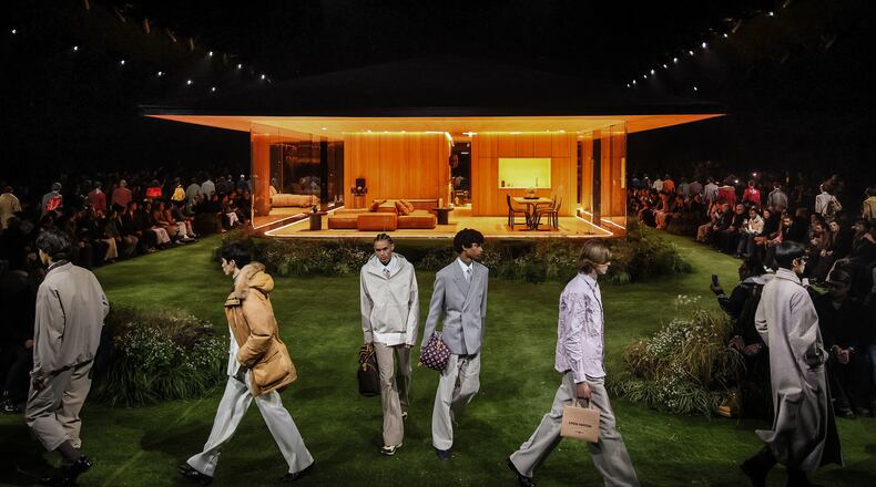 Models wear creations as part of the Louis Vuitton Fall/Winter 2026-2027 Men's collection presented in Paris, Tuesday, Jan. 20, 2026. (AP Photo/Thomas Padilla)