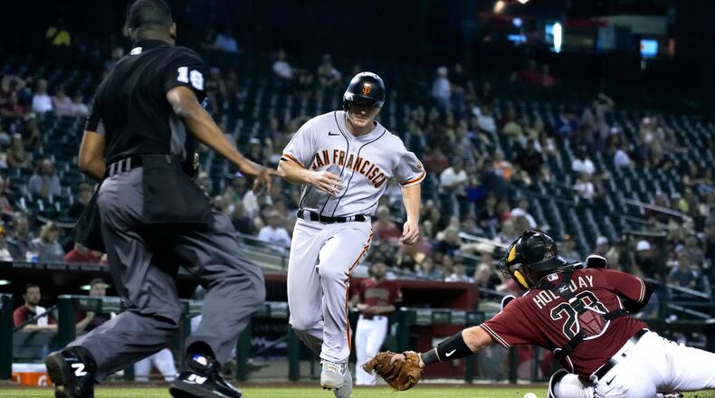 Outfielder Alex Dickerson, who played for the Giants last season, signed a non-guaranteed, major-league contract worth $1 million. (AP Photo/Rick Scuteri)