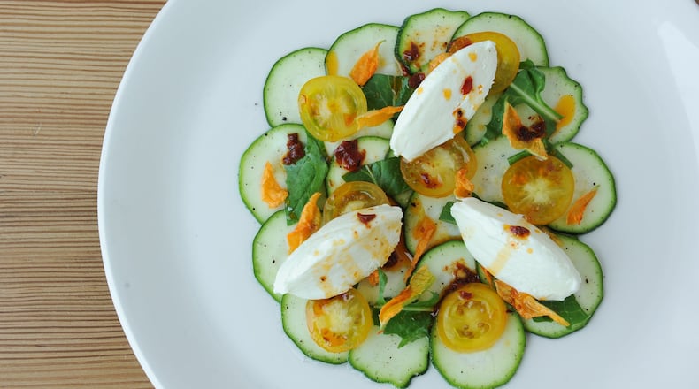 Zucchini Carpaccio with squash blossom, ricotta fresca, peperoncino vinaigrette. (BECKY STEIN PHOTOGRAPHY)