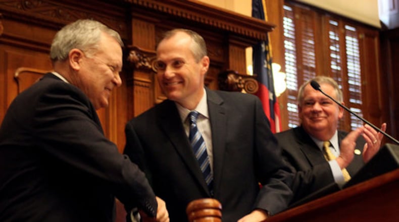 Gov. Nathan Deal is welcomed to the podium by Lt. Gov. Casey Cagle & House Speaker David Ralston. Phil Skinner pskinner@ajc.com Gov. Nathan Deal, Lt. Gov. Casey Cagle and House Speaker David Ralston.