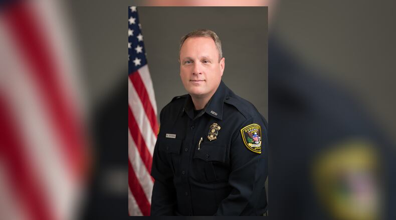 Mark Stevens, the community outreach officer for the Dunwoody Police Department, was arrested in August after being accused of domestic abuse.