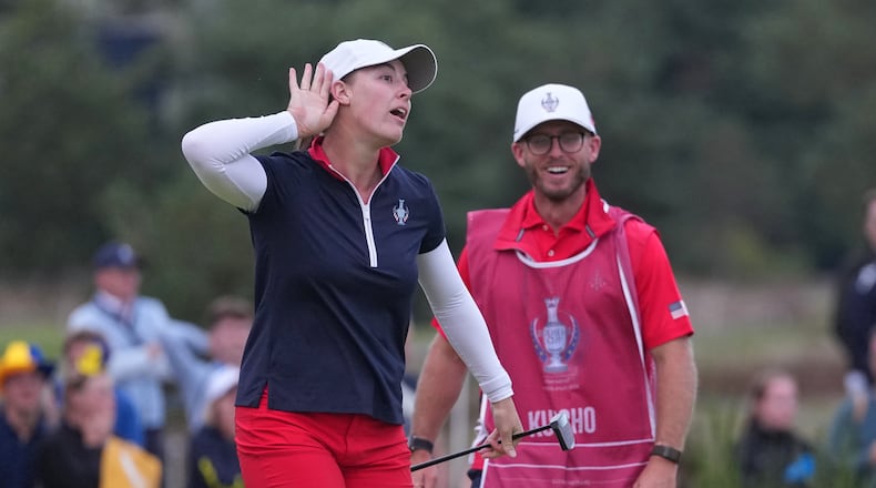 Jennifer Kupcho of the United States celebrates after holing a putt on the 18th green during the Solheim Cup in Den Bosch, Netherlands, Saturday, Sept. 12, 2026. (AP Photo/Alastair Grant)