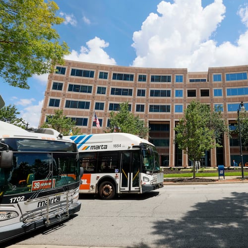 A MARTA bus drives past MARTA headquarters on Piedmont Road NE in Atlanta near the Lindbergh Center rail station on Sunday, Aug. 9, 2026. (Miguel Martinez/AJC)