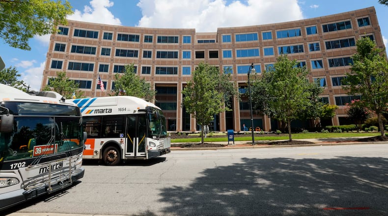 A MARTA bus drives past MARTA headquarters on Piedmont Road NE in Atlanta near the Lindbergh Center rail station on Sunday, Aug. 9, 2026. (Miguel Martinez/AJC)