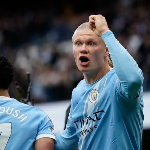 Manchester City's Erling Haaland, right, celebrates with Manchester City's Omar Marmoush after scoring his side's opening goal during the English Premier League soccer match between Manchester City and Brentford in Manchester, Saturday, May 9, 2026. (AP Photo/Dave Thompson)
