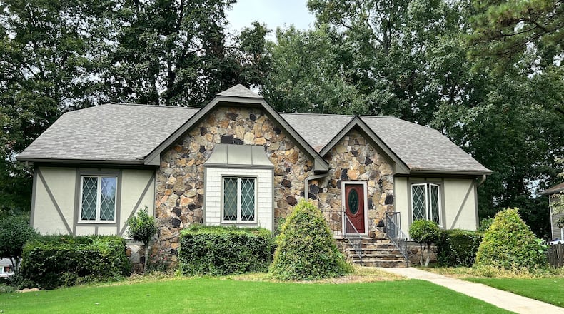 Gwinnett County police believe this Lawrenceville-area home is where a woman was beaten and starved to death.