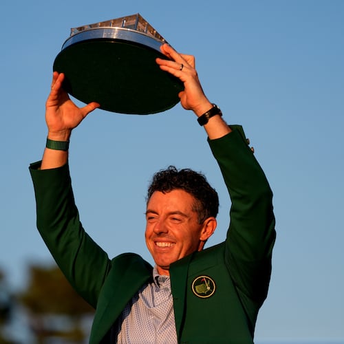 Rory McIlroy, of Northern Ireland, holds the trophy after winning the Masters golf tournament at the Augusta National Golf Club, Sunday, April 12, 2026, in Augusta, Ga.(AP Photo/Ashley Landis)