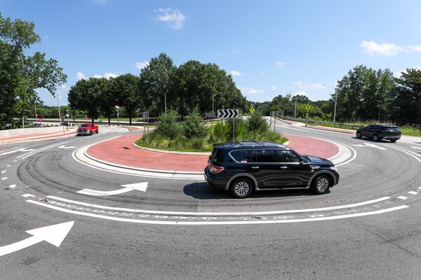 There's a 50% chance the drivers in this photo are screaming. (Arvin Temkar/AJC)