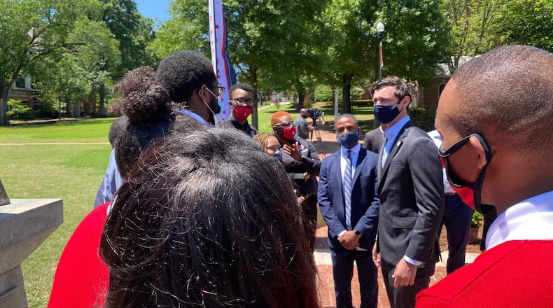 U.S. Sen. Jon Ossoff, center, speaks to a group of Clark Atlanta University students on Friday, May 7, 2021. Ossoff visited the campus to discuss federal funding that will soon come there and to other historically Black colleges in Atlanta for coronavirus pandemic relief. ERIC STIRGUS/ESTIRGUS@AJC.COM.