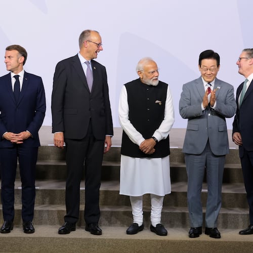 From left, Canada's Prime Minister Mark Carney, France's President Emmanuel Macron, Germany's Chancellor Friedrich Merz, India's Prime Minister Narendra Modi, South Korea's President Lee Jae Myung, and British Prime Minister Keir Starmer stand as leaders pose for a group photo, on the opening day of the G20 Leaders' Summit, in Johannesburg, South Africa, Saturday, Nov. 22, 2025. (Yves Herman/Pool Photo via AP)