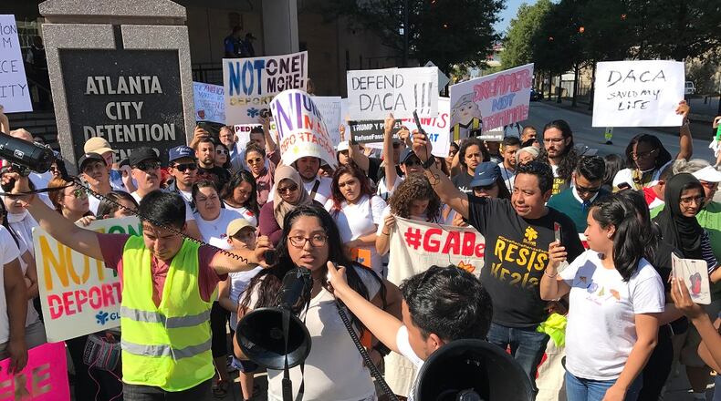 Hundreds of activists on Monday demonstrated outside the Atlanta City Detention Center in favor of an Obama administration program that temporarily shields young immigrants from deportation.