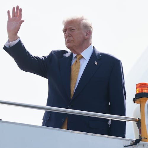 President Donald Trump waves as he boards Air Force One at Kuala Lumpur International Airport in Sepang, Malaysia, as he departs for Japan, Monday, Oct. 27, 2025. (AP Photo/Mark Schiefelbein)