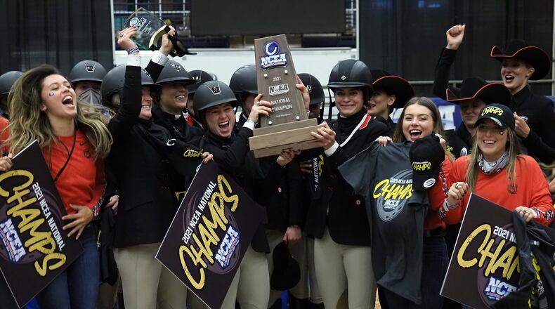 Members of Georgia's equestrian team celebrate winning the 2021 National Collegiate Equestrian Association National Championship April 17, 2021, in Waco, Texas. (Brendan Maloney)