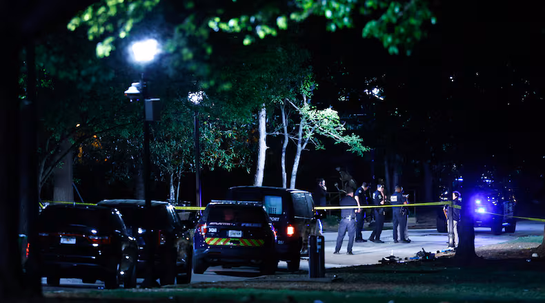 Atlanta police respond to a fatal shooting inside Piedmont Park late Saturday, April 4, 2026. (Arvin Temkar / AJC)