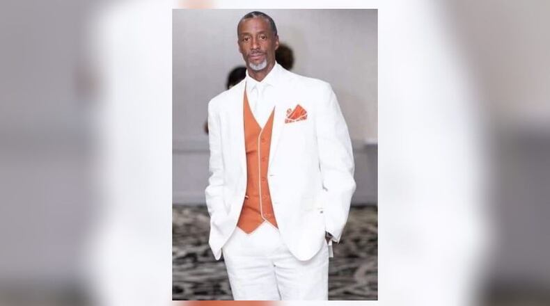 Dean Phillips, 54, was shot to death outside Manuel's Tavern. Witnesses said he was trying to stop a man from breaking into cars.