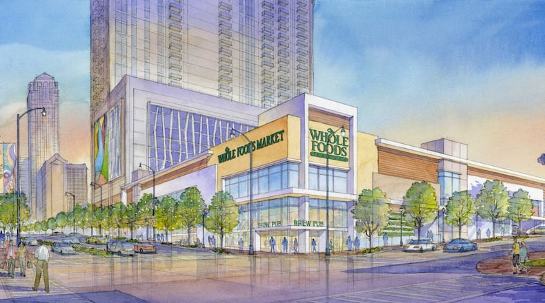 An artists rendering shows a Midtown location of a planned Whole Foods Market at 14th and West Peachtree Streets. The Decide DeKalb Development Authority voted Friday to approve $1.8 million in tax incentives for a development anchored by a 365 by Whole Foods Market near Decatur.