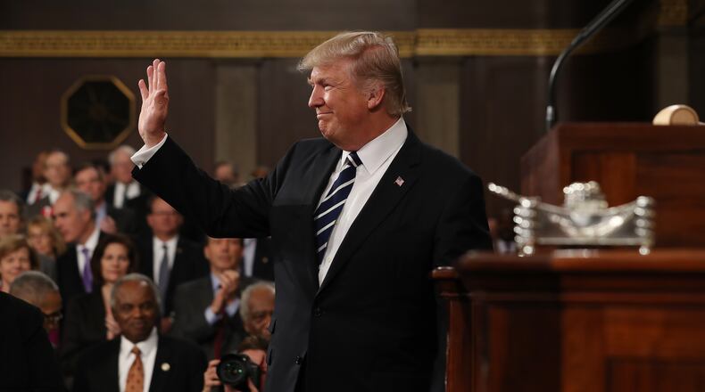 President Donald Trump arrives Tuesday to deliver an address to a joint session of the U.S. Congress. (Photo by Jim Lo Scalzo - Pool/Getty Images)