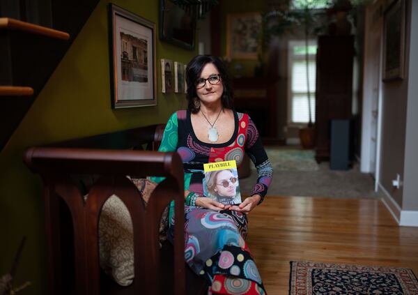 Kelly Nelson poses for a portrait holding a photo of her friend and assistant, Trey Peters, at her home, Wednesday, July 22, 2020, in Smyrna, Ga.  Peters, a gay man in an interracial relationship, was killed in what was has been considered a hate crime in Decatur last year.  BRANDEN CAMP FOR THE ATLANTA JOURNAL-CONSTITUTION 