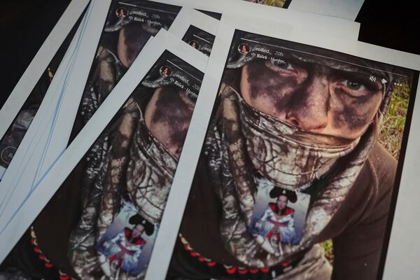 Handout screenshots of suspect Wess Roley's Instagram story are seen at the Kootenai County Sheriff's Office during a press conference the day after Roley ambushed, shot and killed multiple firefighters responding to a wildfire at Canfield Mountain Monday, June 30, 2025, in Hayden, Idaho. (AP Photo/Lindsey Wasson)