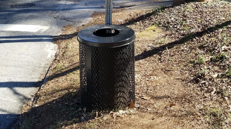 This trash can at Headland Drive and Dodson Drive helps keep the MARTA stop free of litter. CONTRIBUTED