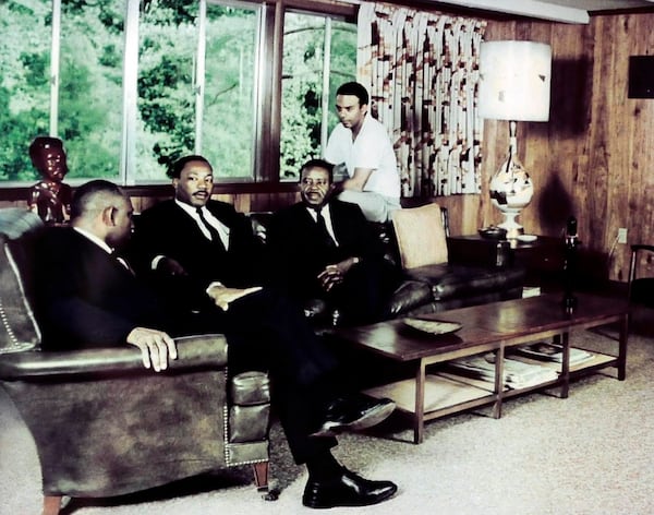 Herman Russell (left) with Martin Luther King Jr., Ralph David Abernathy and Andrew Young at Russell's Collier Heights home in the early 1960's. (Photo courtesy of the Russell family)