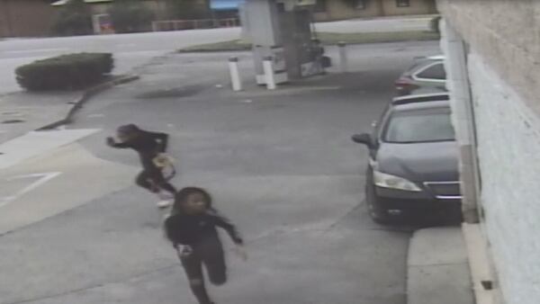 The two young women pictured are wanted for questioning in connection with the shooting.
