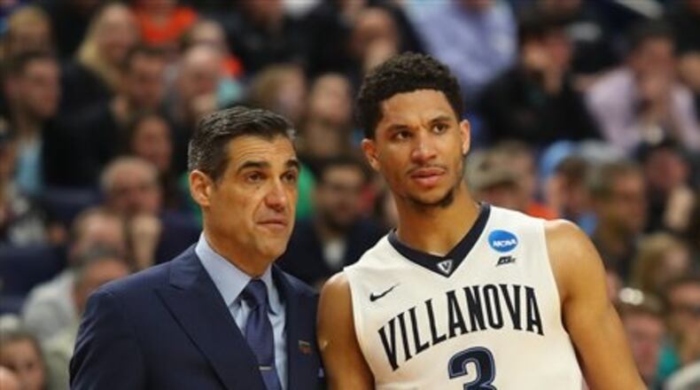 Villanova head coach Jay Wright and Josh Hart (3) talk during the second half of a second-round men's college basketball game against Wisconsin in the NCAA Tournament, Saturday, March 18, 2017, in Buffalo, N.Y. Wisconsin won, 65-62.  (AP Photo/Bill Wippert)