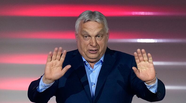 Hungary's Prime Minister Viktor Orban addresses supporters after receiving the results of a parliamentary election in Budapest, Hungary, Sunday, April 12, 2026. (AP Photo/Petr David Josek)