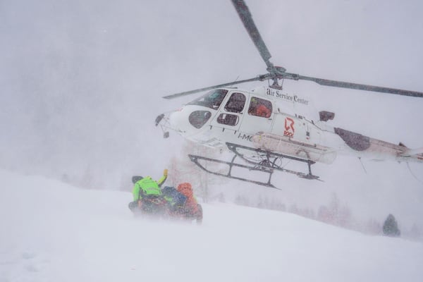 Italian National Alpine and Speleological Rescue Corps, attend a training in Col Gallina, near Cortina D'Ampezzo, northern Italy, Tuesday, March 25, 2025. (AP Photo/Luca Bruno)