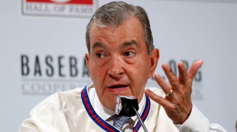 Atlanta Braves president John Schuerholz speaks during a media availability at Major League Baseball's winter meetings, Monday, Dec. 5, 2016 in Oxon Hill, Md. Schuerholz, who was the Braves general manager during the team's 14-straight division run of the 1990s, was voted into the 2017 class of baseball's Hall of Fame.