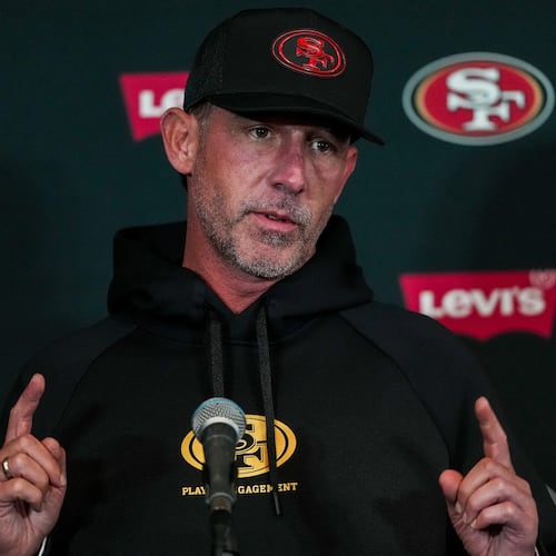 San Francisco 49ers head coach Kyle Shanahan speaks to the media ahead of practice Monday, Sept. 7, 2026, in Melbourne, Australia, in preparation for an NFL football game against the Los Angeles, Rams. (AP Photo/Asanka Brendon Ratnayake)