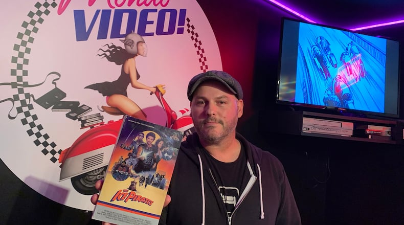 Woodstock animator Anthony Sant'Anselmo spent three years building out his dream 1980s era video rental store in his basement called Mondo Video. He spared no details. RODNEY HO/rho@ajc.com