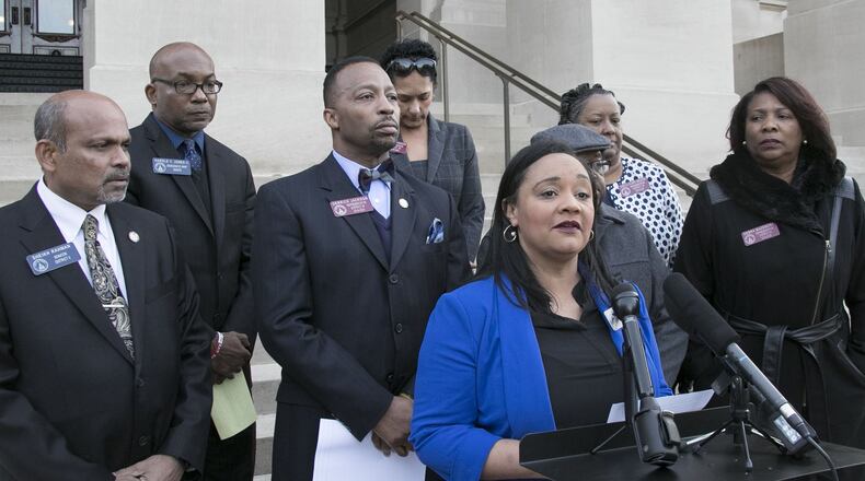 Nikema Williams, chairperson of the Democratic Party of Georgia, speaks against President Donald Trump ahead of his visit to Atlanta on Nov. 8, 2019. (Bob Andres / robert.andres@ajc.com)