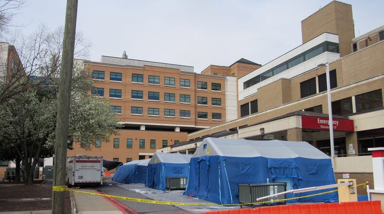 Tents are set up behind Wellstar Kennestone Hospital in Marietta. Photos: Jennifer Brett, jbrett@ajc.com