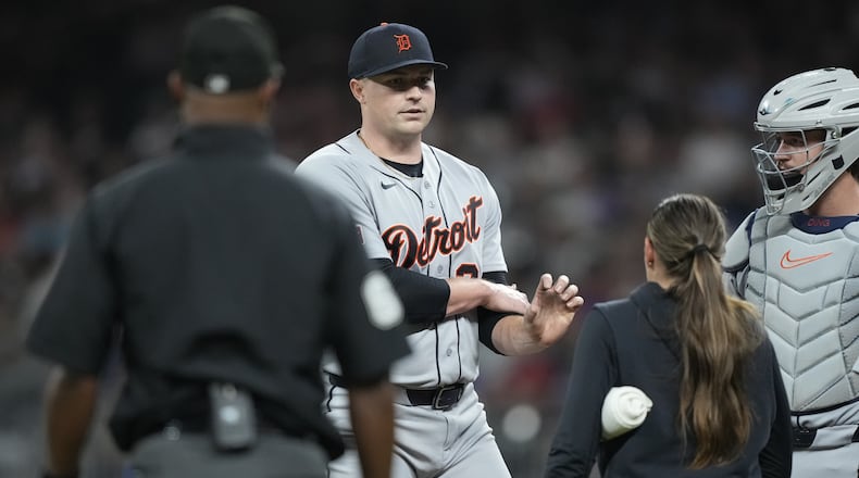 Detroit Tigers pitcher Tarik Skubal (29) rubs his arm during the seventh inning of a baseball game against the Atlanta Braves Wednesday, Apr. 29, 2026, in Atlanta. (AP Photo/Brynn Anderson)