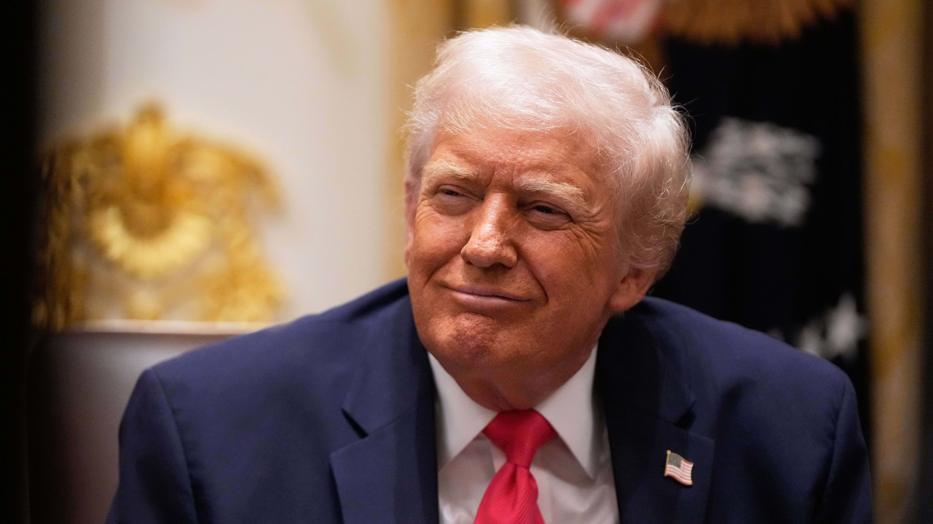 President Donald Trump listens during a Cabinet meeting at the White House, Tuesday, Dec. 2, 2025, in Washington. (AP Photo/Julia Demaree Nikhinson)