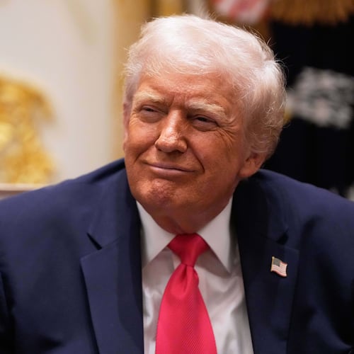 President Donald Trump listens during a Cabinet meeting at the White House, Tuesday, Dec. 2, 2025, in Washington. (AP Photo/Julia Demaree Nikhinson)