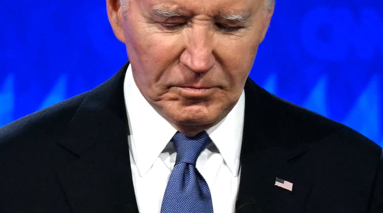 President Joe Biden looks down as he participates in the first presidential debate of the 2024 elections with former President Donald Trump in Atlanta on Thursday, June 27, 2024. (Andrew Caballero-Reynolds/AFP/Getty Images/TNS)
