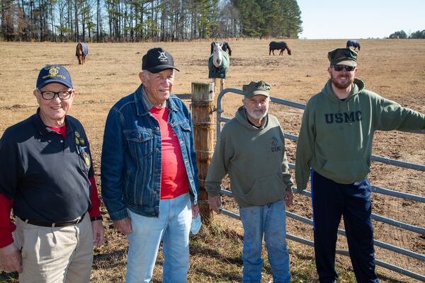Arnie Geiger (from left), Hoyt Davis Charlie Santoriello and Mike Vernon, who are part of the Horses & Warriors program at the Calvin Center Equestrian area in Hampton, GA. Because of COVID, all of the equestrian programs have suffered financially and there are a lot of needs at the Calvin Center. The veteran volunteers have stepped up, providing free maintenance, mowing the lawn, buying hay for the horses, etc. PHIL SKINNER FOR THE ATLANTA JOURNAL-CONSTITUTION.