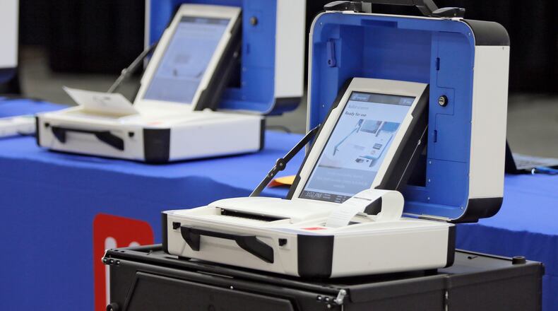 8/30/18 - Grovetown - Hart InterCivic Verity voting machines and scanners setup for that company's presentation.  Voting machine companies demonstrated their products Thursday at the second meeting of Secretary of State Brian Kemp's Secure, Accessible & Fair Elections Commission, which is evaluating whether to switch from electronic voting machines to ones that offer paper ballots for verification and auditing.  Vendors present included Clear Ballot, Unisyn Voting Solutions, Smartmatic, Election Systems & Software, Hart InterCivic, and Dominion Voting.  BOB ANDRES  /BANDRES@AJC.COM